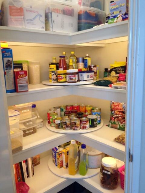 Show us an organization problem, and we'll show you a lazy Susan. The corner in your pantry usually ends up being the black hole where cans or bags go to be lost forever — but when you install spinners in this space instead, nothing will be forgotten again.<br />See more at The Whoot »<br />