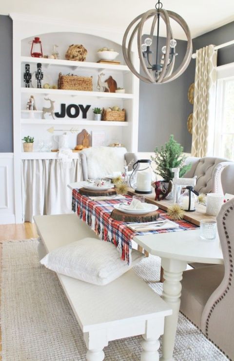 It doesn't take much to decorate a neutral room for the holidays. This&nbsp;blogger draped a vintage blanket&nbsp;over her white table to add color and creativity to with zero to no work involved. See more at City Farmhouse » 