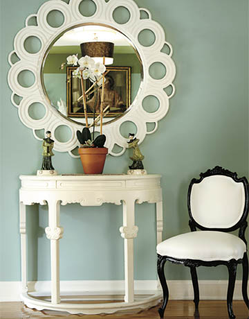 Entry Wall Color Green foyer with green walls mirror chair and console table